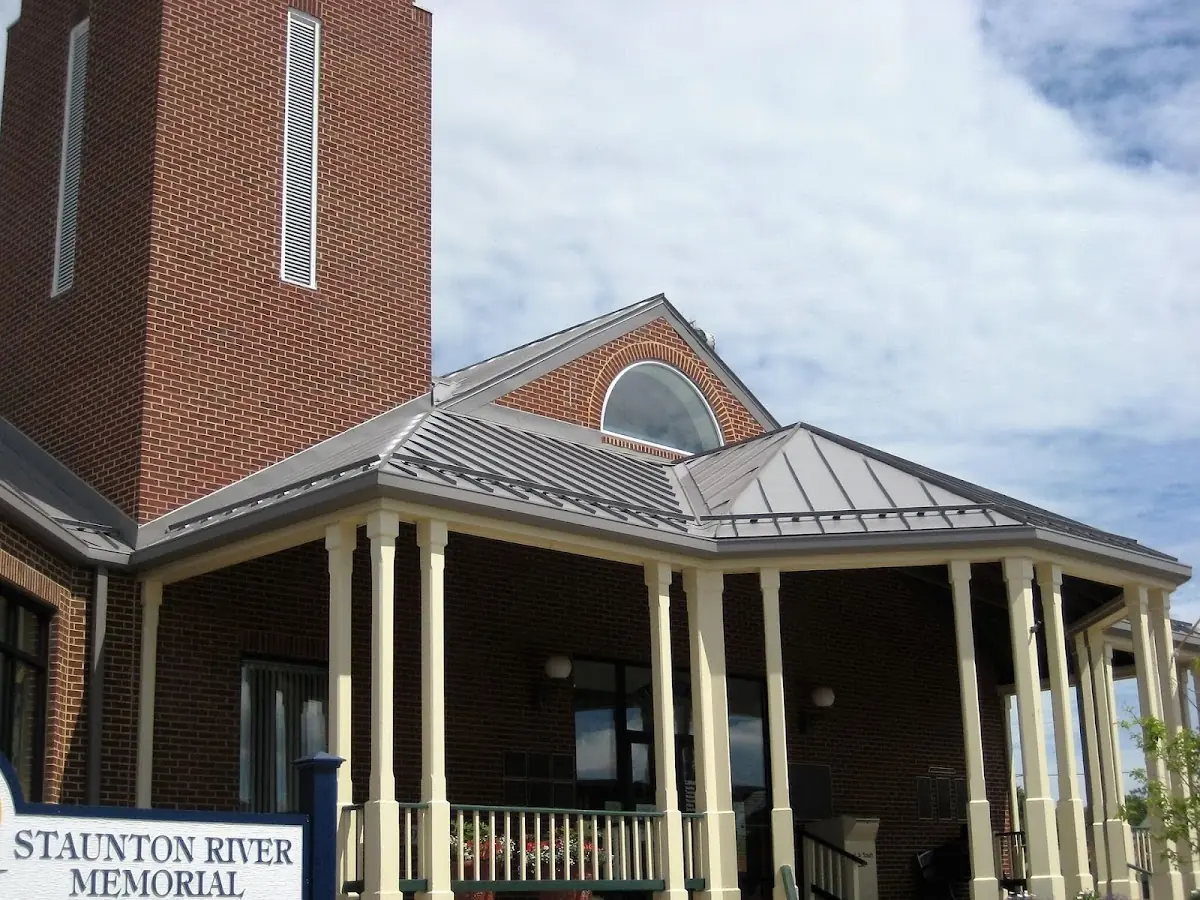 Skilled roofing craftsmen working on a residential roof in Montevallo
